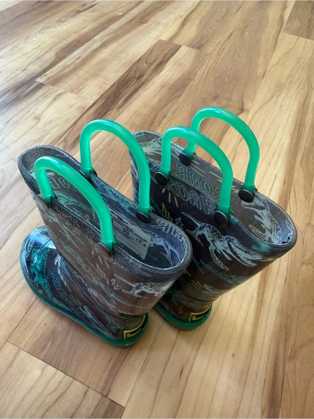 Western Chief Charcoal Rain Boots with Teal Dinosaur Accents